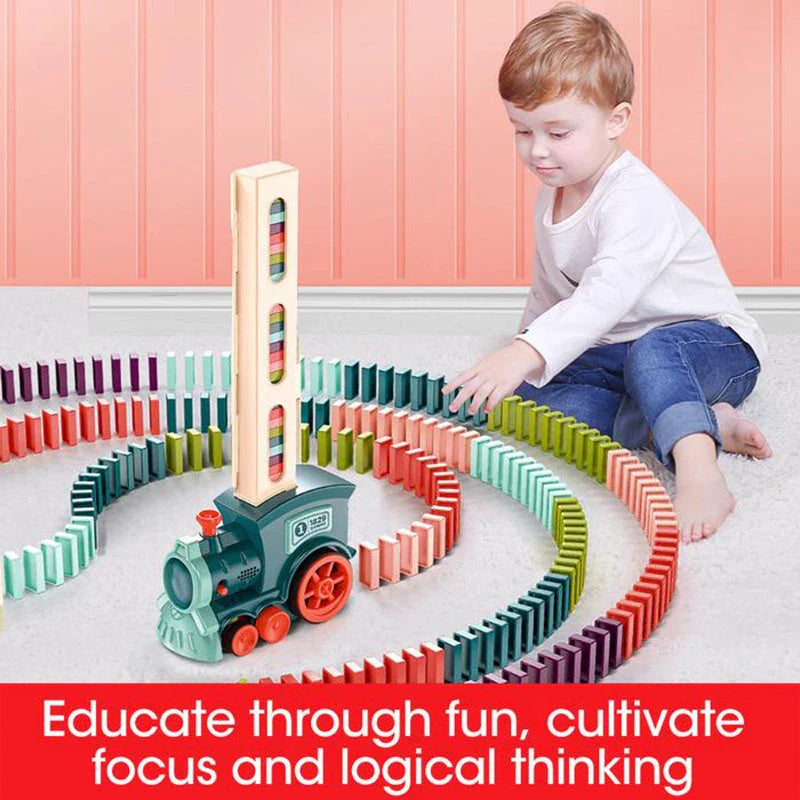 Domino train toy with automatic release feature for creative play