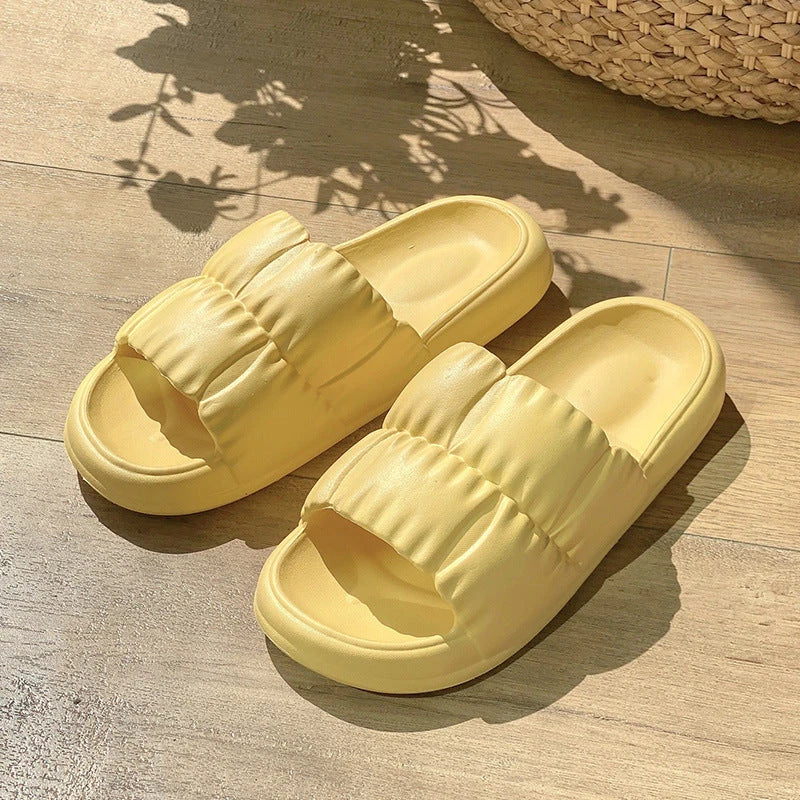 Plush Bathroom Slides in various colors and designs, featuring a soft, comfortable EVA sole and breathable upper material.