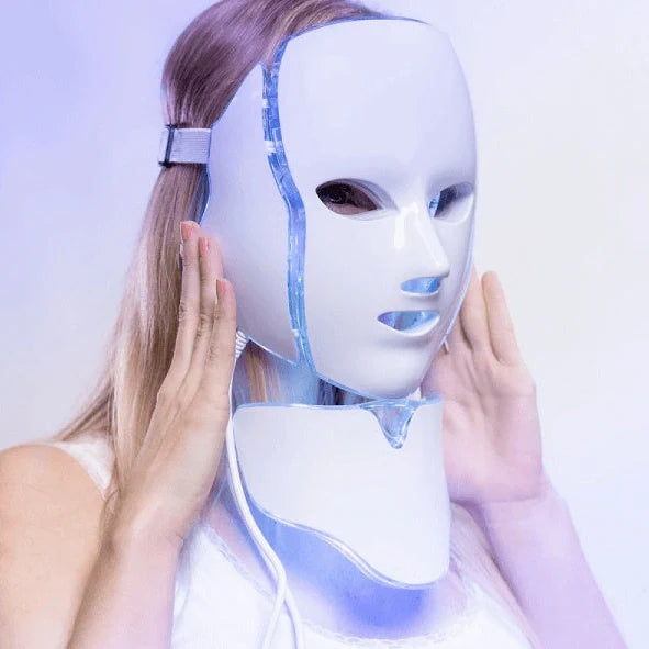 White plastic LED mask spectrometer for acne treatment with dimensions 24.5cm × 24.0cm × 17.0cm