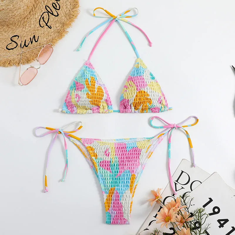 Women's triangle bikini swimsuit with floral gradient pattern and smocking craft detailing