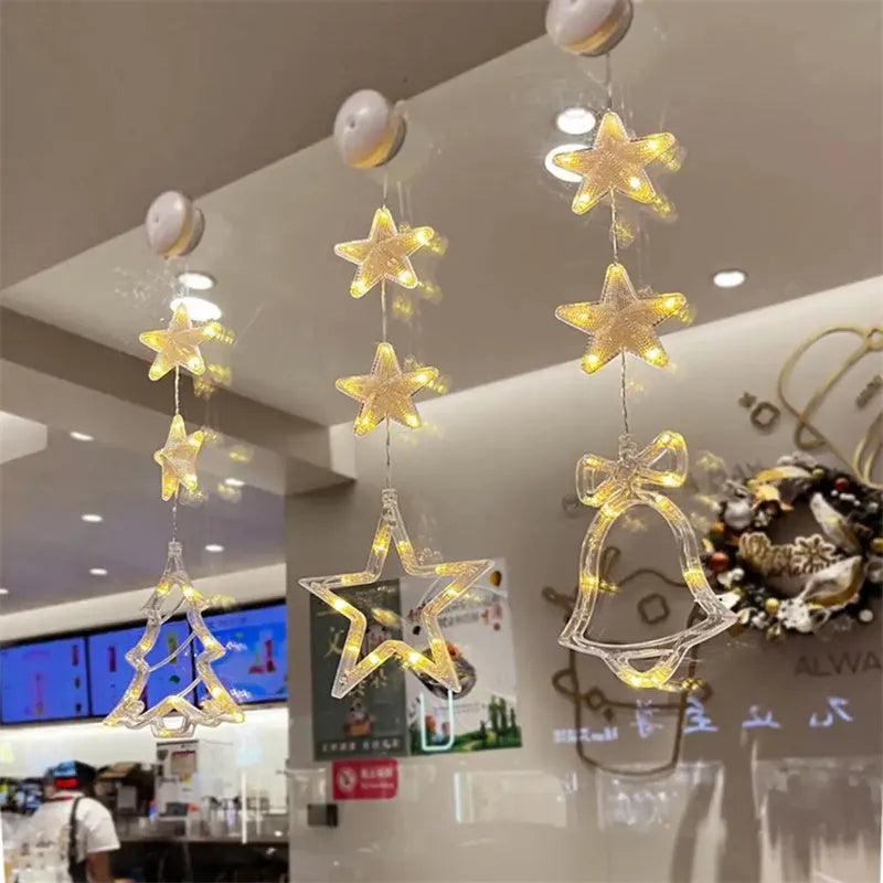 Set of three battery-powered LED Christmas pendant lights with suction cups for window decoration