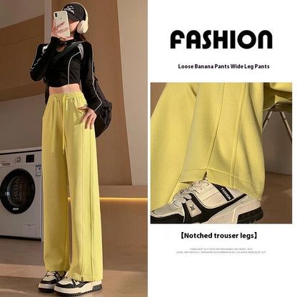 Women's high waist cotton sweatpants in various colours, featuring a straight-leg design and pockets.