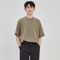 Men's brown drape knit loose casual T-shirt with short sleeves on hanger