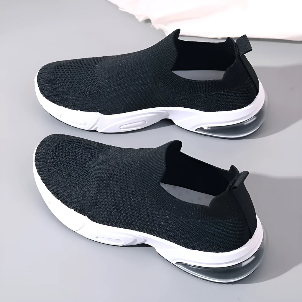Slip-on breathable sock shoe in a low-top design with a mesh upper and PVC sole.