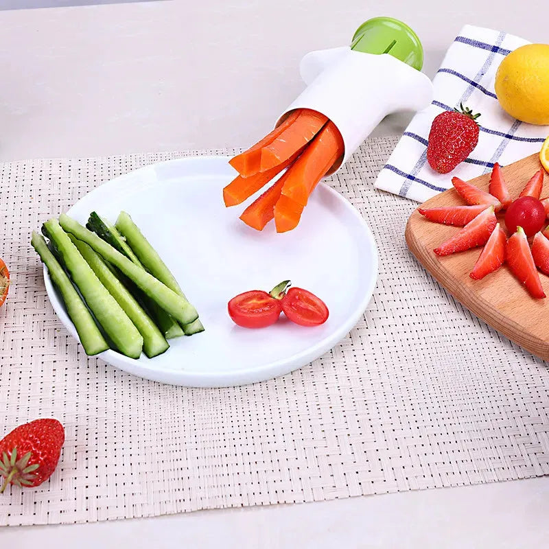 White kitchen vegetable slicer with six stainless steel blades for cucumbers and carrots.