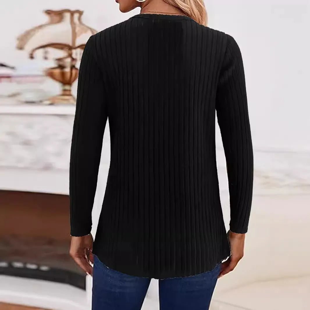 A simple solid-colour knitted button sweater in grey green, shown on a hanger.