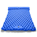 Double-wide camping air mattress with integrated pillow in army green colour, shown inflated.