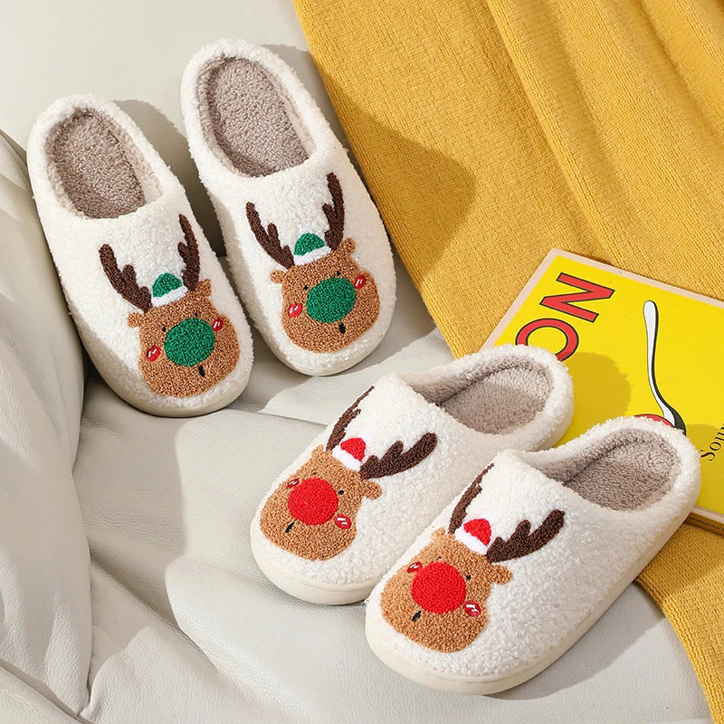 Cozy festive elk-themed slippers in red and green colors, featuring plush, soft materials for comfortable indoor wear