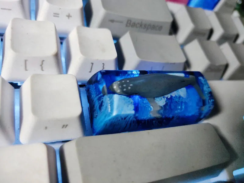 Blue scenic koi fish resin keycaps for Cherry MX mechanical keyboards showing spacebar and individual keys