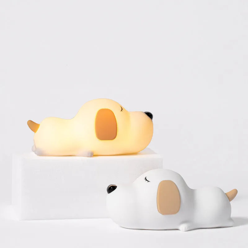 Silicone cartoon dog night light with two-colour design, powered by a USB cable.