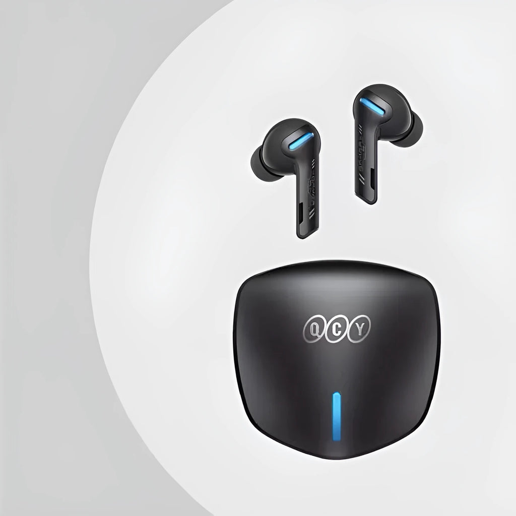 Grey QCY G1 wireless Bluetooth gaming headset with charging case and ear tips