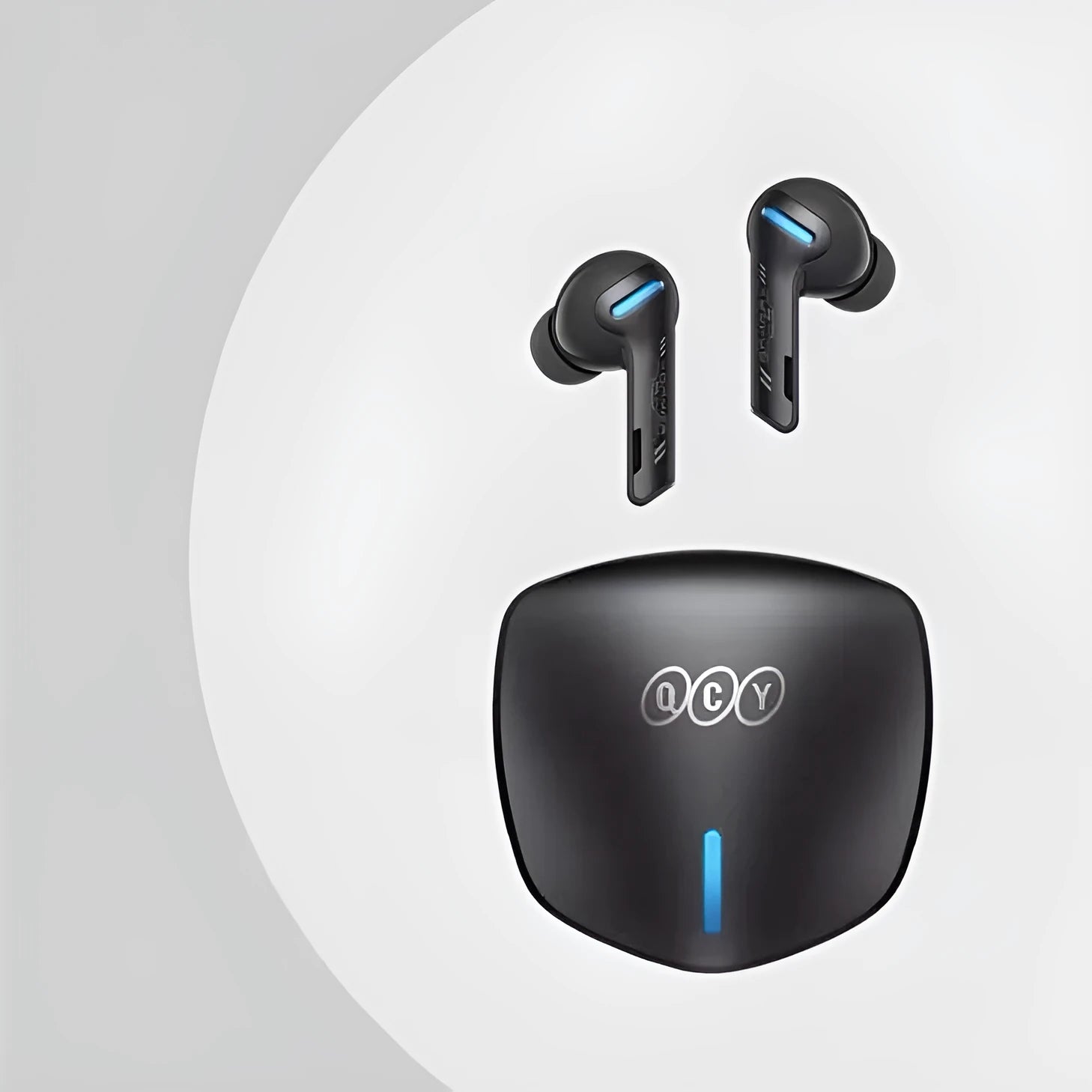 Grey QCY G1 wireless Bluetooth gaming headset with charging case and ear tips