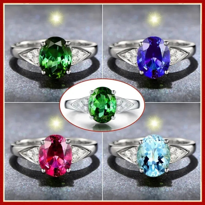 A ladies' court style ring with natural zircon inlay forming heart, water drop, and bell patterns on a silver-toned band.