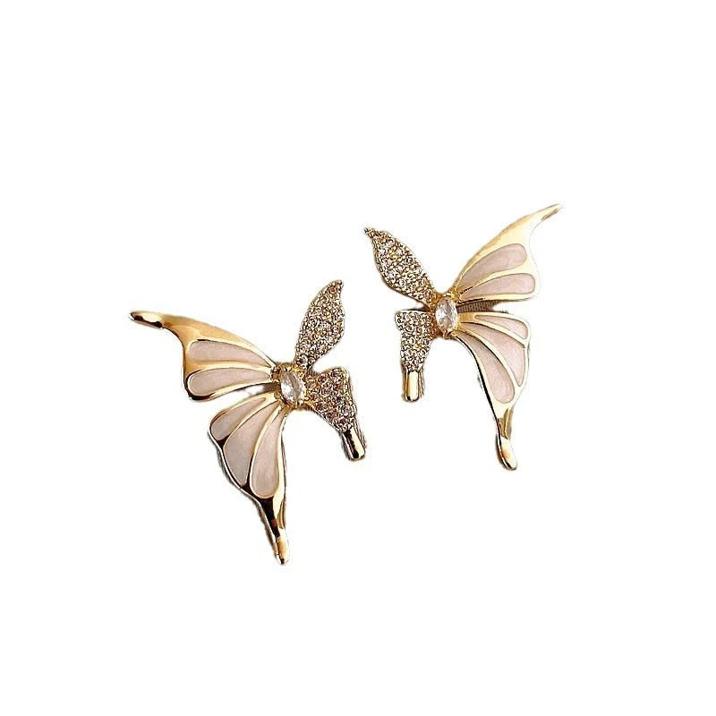 Rhinestone-dripped butterfly stud earrings in alloy with diamond treatment, available in colors A128 and A129