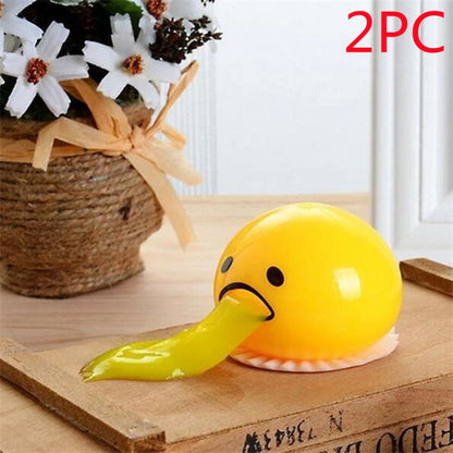 Gudetama Vomiting Egg Toy in green, orange, pink, and yellow