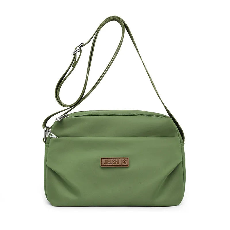 Women's soft nylon multi compartment shoulder bag in urban simplicity style, horizontal square shape, available in multiple colours