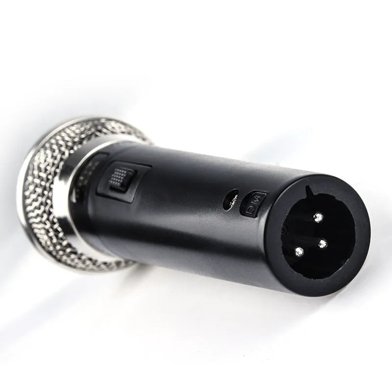 Black wired moving coil sound card live microphone with 3-metre thread cable on a table