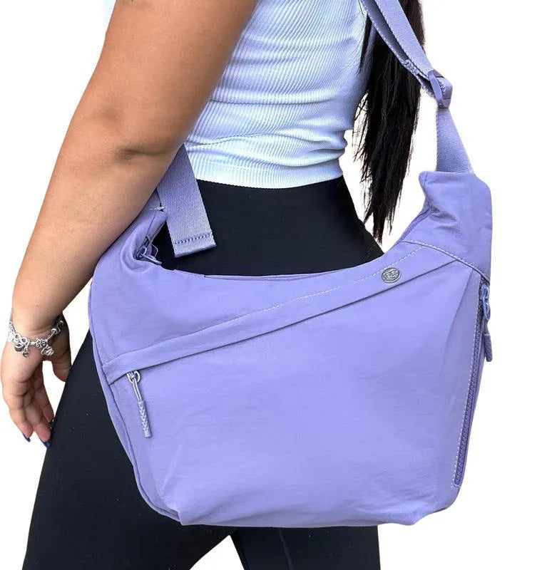 Men's PU canvas shoulder bag with adjustable strap in black, shown on a model for scale