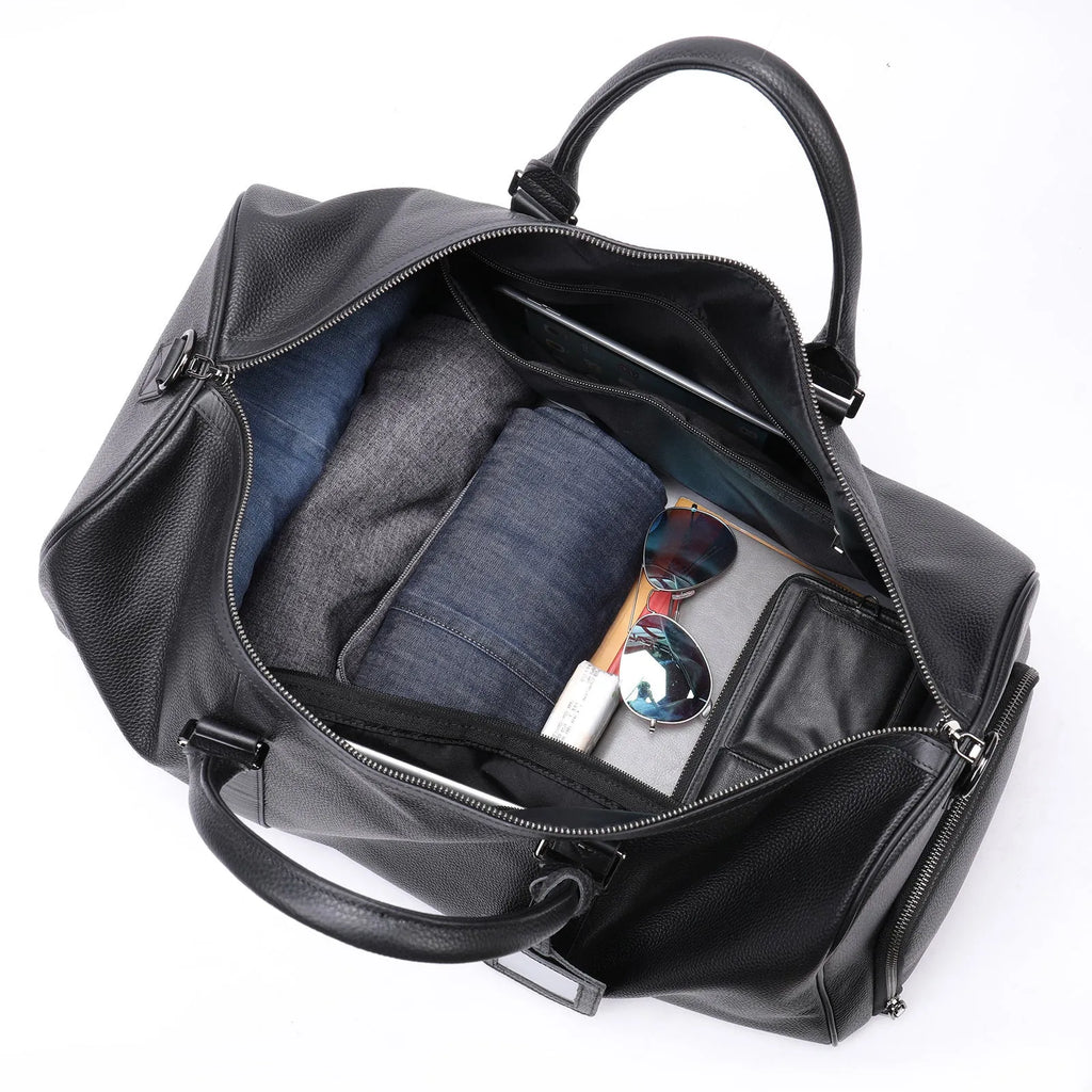 Men's leather excursion tote bag in black or coffee colour showing top-layer cowhide construction