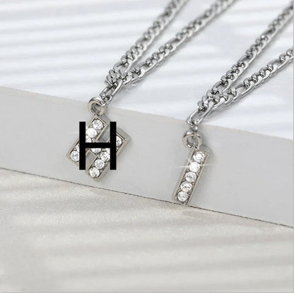 Customizable stainless steel anklet with zircon letters, available in various letter and silver letter options