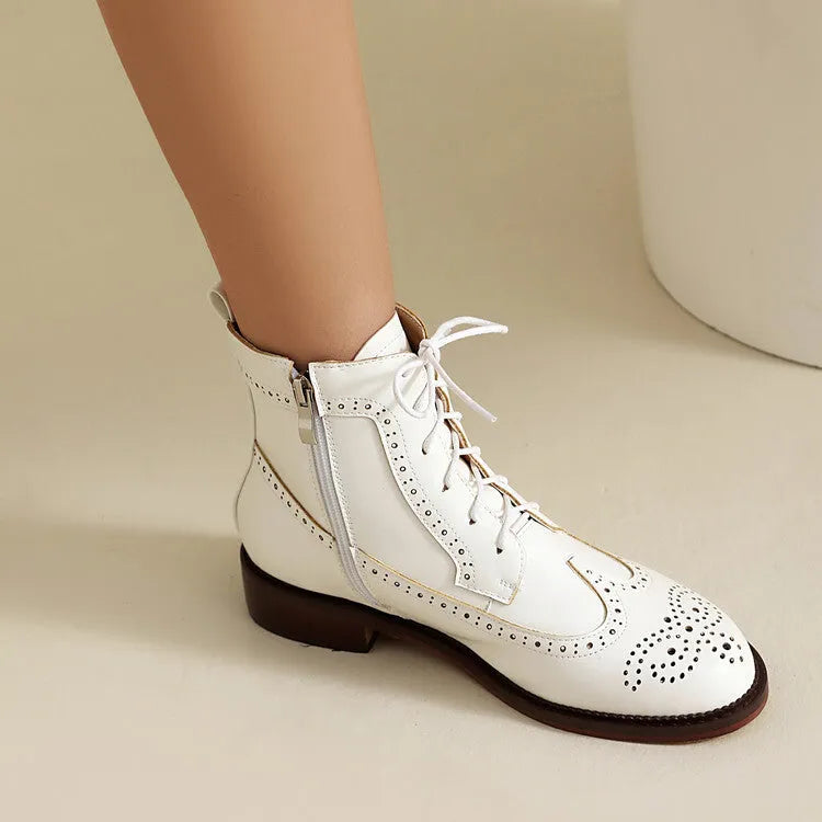 Women's chunky heel black classic boots with pointed toe, leather lining, and ethnic pattern