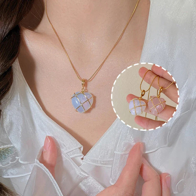 Heart-shaped moonstone pendant necklace with gold plating and adjustable chain