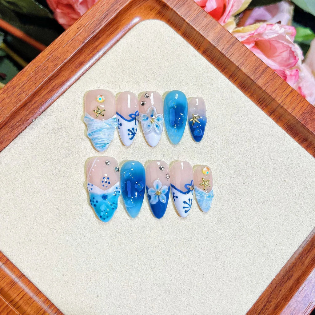 Blue hand-painted carved summer ice transparent false nails set in plastic wearable armour