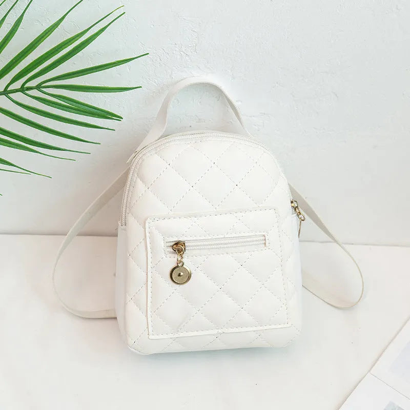 Girls' Korean style embroidery backpack in PU material with hard case construction measuring 16x7x19cm
