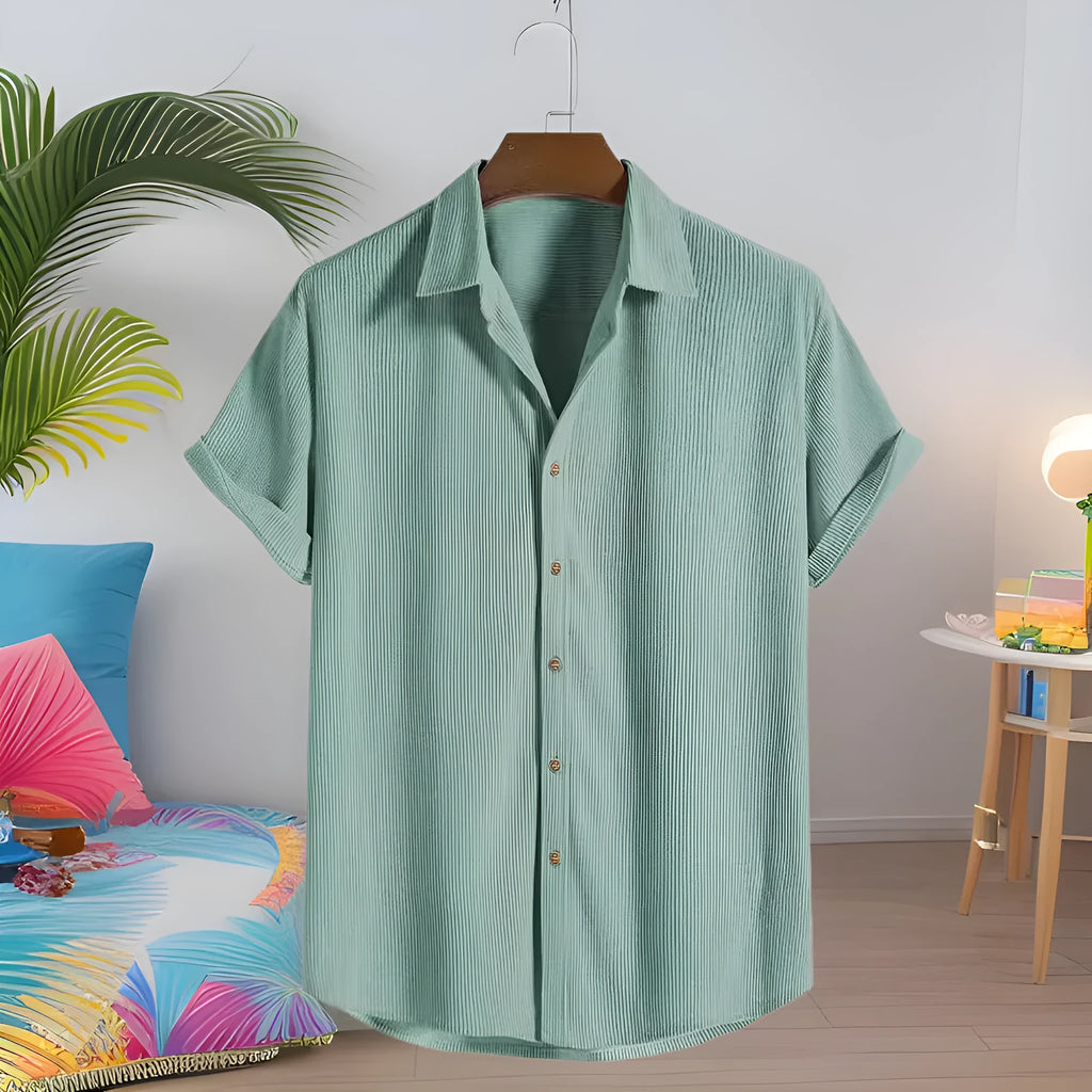 Man wearing a short-sleeved casual cardigan-style shirt in a GKESJ colour.