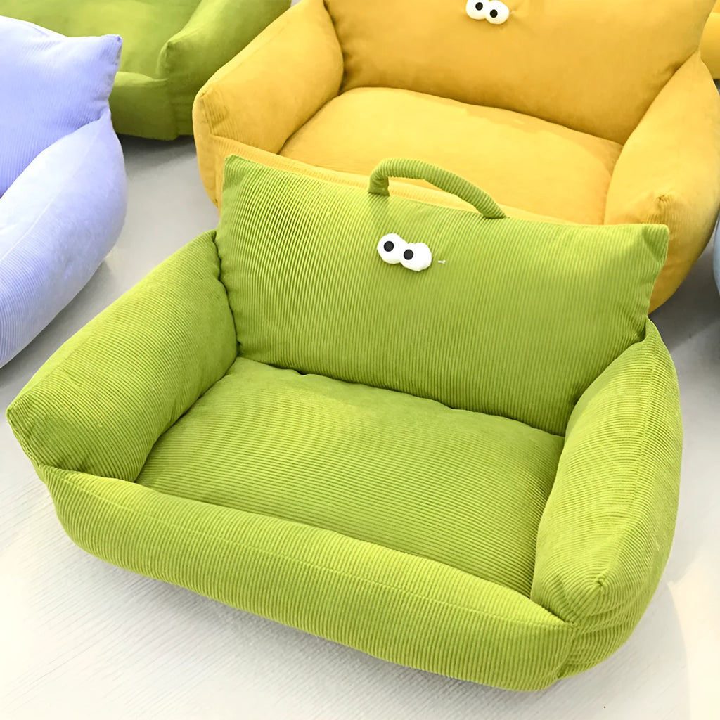 Cartoon Big Eye Nest pet bed in Moon velvet fabric for cats and small dogs, shown in blue.