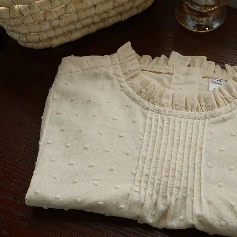 Girls cotton long sleeve polka dot top with lace trim, light apricot colour, spring clothing