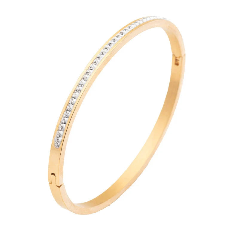 Single row stainless steel bracelet with diamond opening in gold, rose gold, or steel