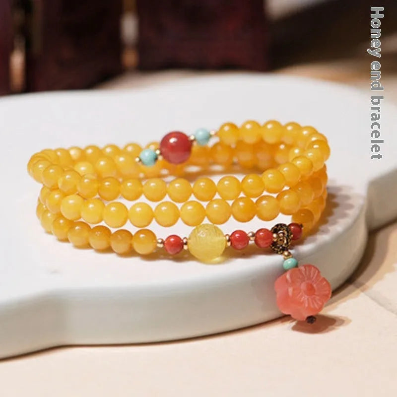 Yellow chicken grease beeswax amber bracelet with animal zodiac design and 5mm round retro styling