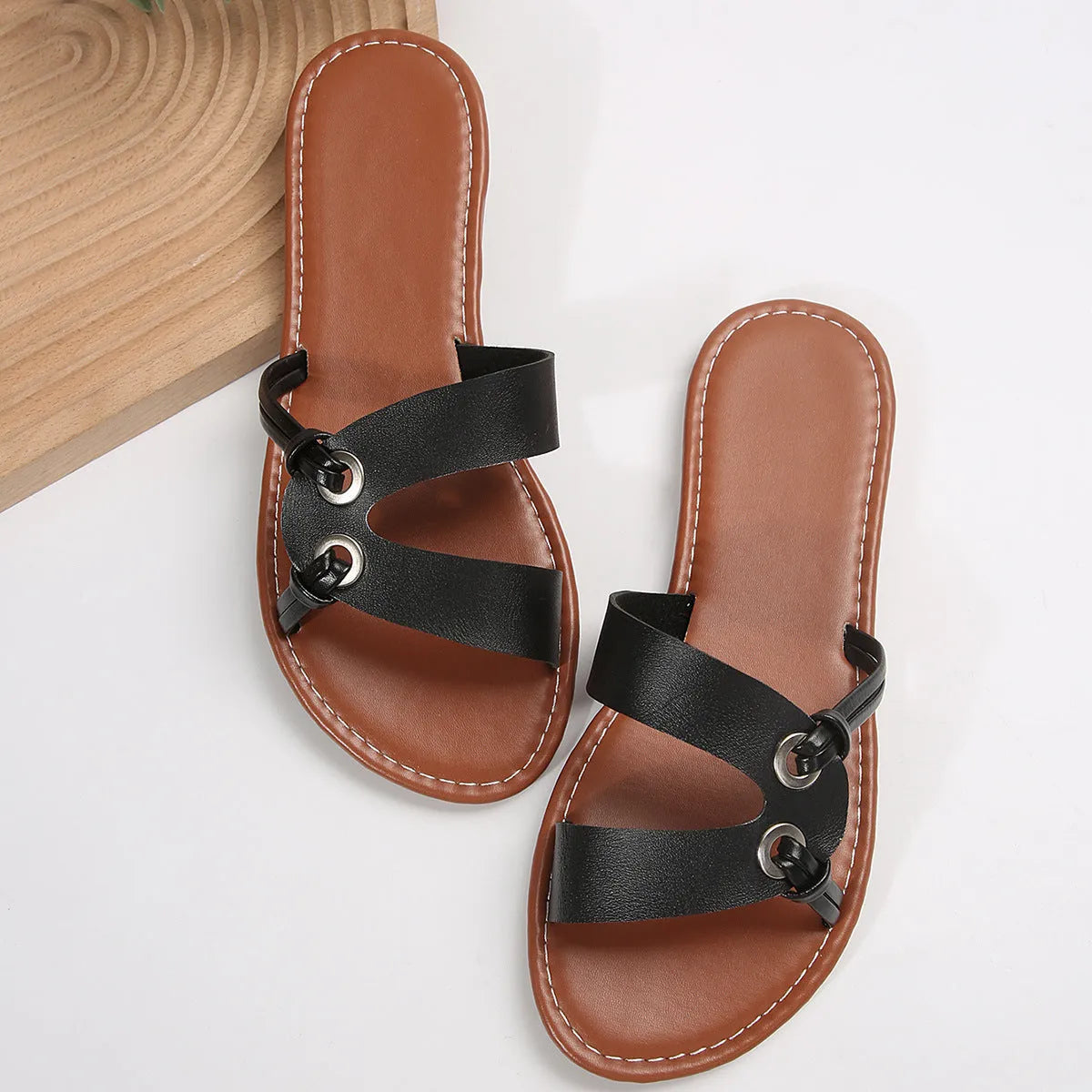 Women's round toe flat sandals in light brown with PU upper and rubber sole