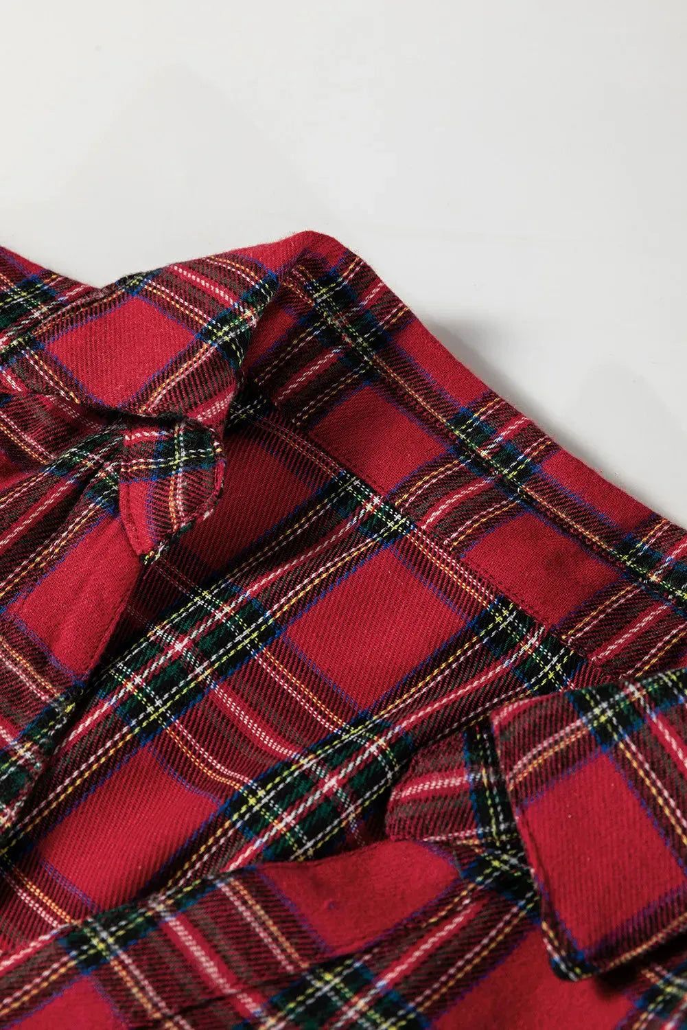 Red plaid check mini dress with shirt collar and ruffle hem detail
