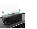 Black PU leather hanging storage box with paper bag design, shown suspended.