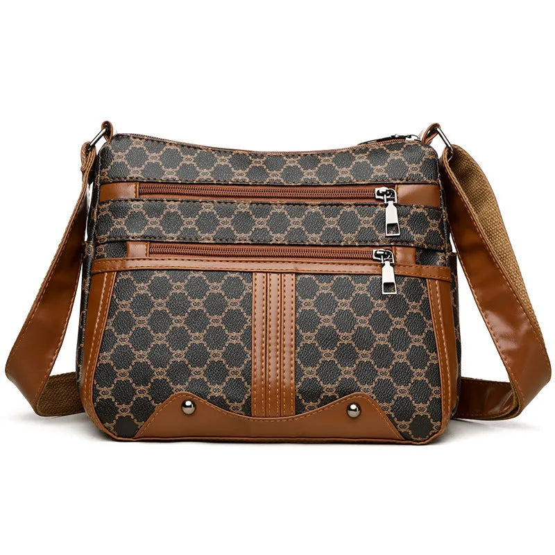 Brown women's crossbody bag with stitching pattern detailing and large storage capacity