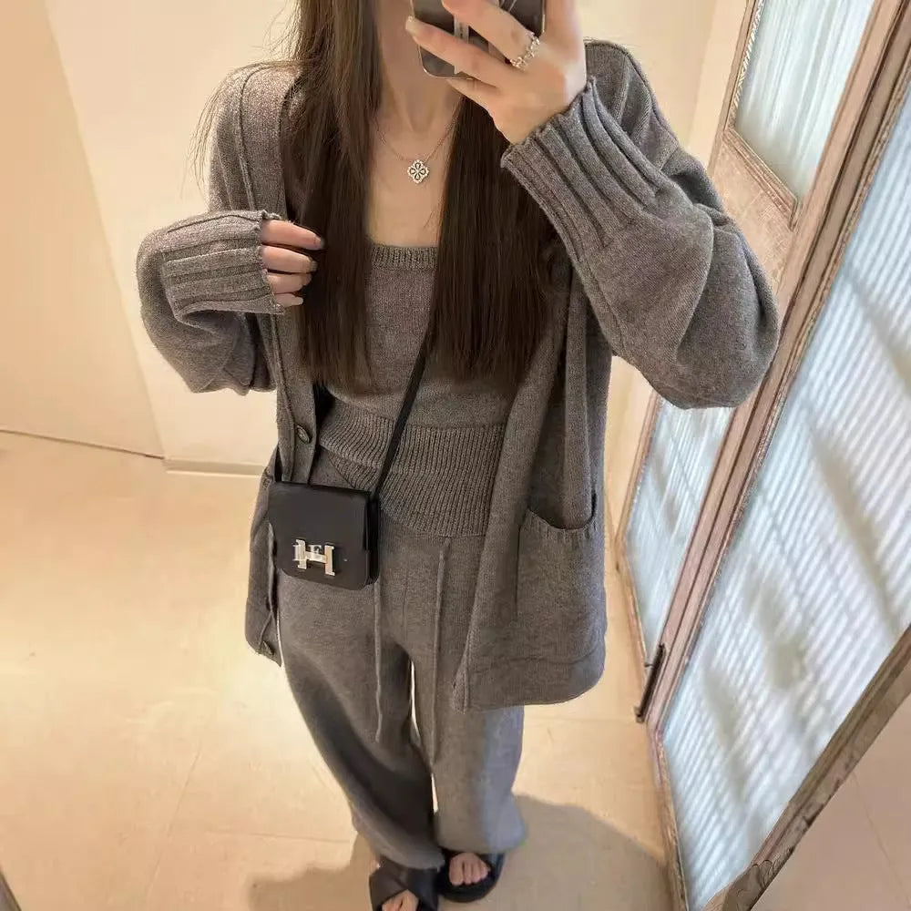 Women's light brown knitted cardigan, vest, and loose pants three-piece casual outfit set.
