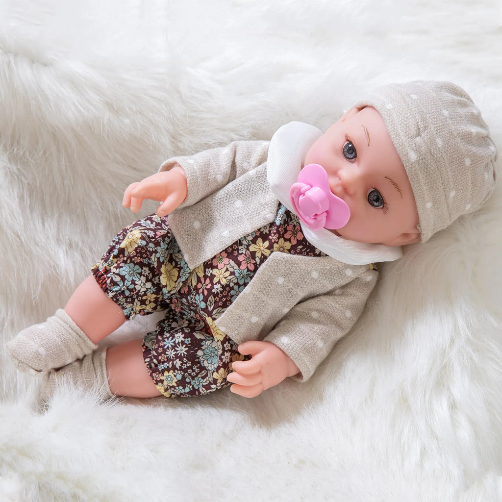 Full vinyl baby doll 30cm with changeable clothes suit in TM-010 colour option, standing on a plain background