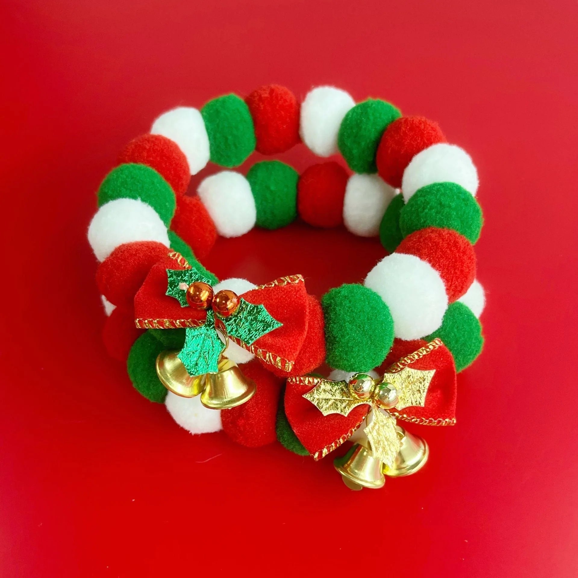 Festive plush ball pet collar for dogs and cats in green and golden leaves designs
