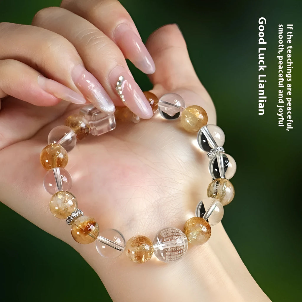 Women's white crystal beaded bracelet with yellow freshwater pearls and citrine yellow tower crystal accents