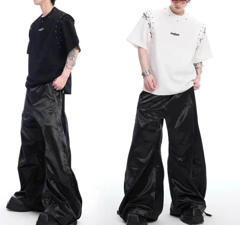 Men's black deconstruction style short sleeve t-shirt with a lace-up cutout panel on the front.