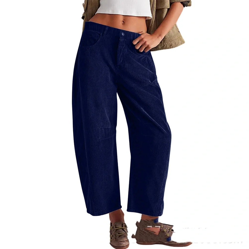 Women's straight-leg corduroy trousers in dark green with loose fit through hips and thighs
