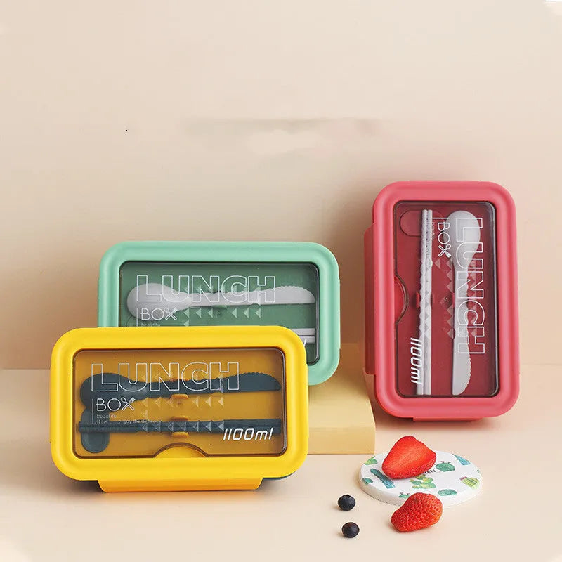 Green four-layer partitioned bento lunch box showing separate food compartments