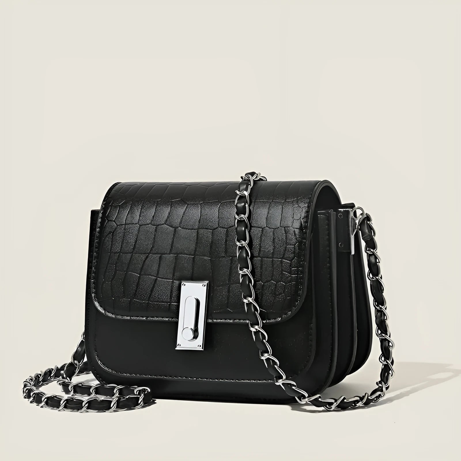Soft black PU women's chain shoulder bag with sewing thread detail and a phone pocket.