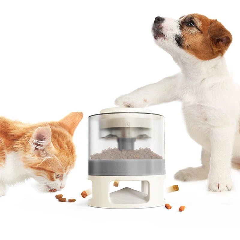 Interactive dog food feeder with anti-slip base in white and yellow