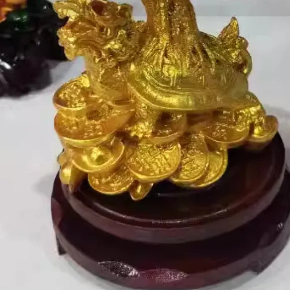 Citrine-coloured resin turtle money tree ornament with Chinese design style.