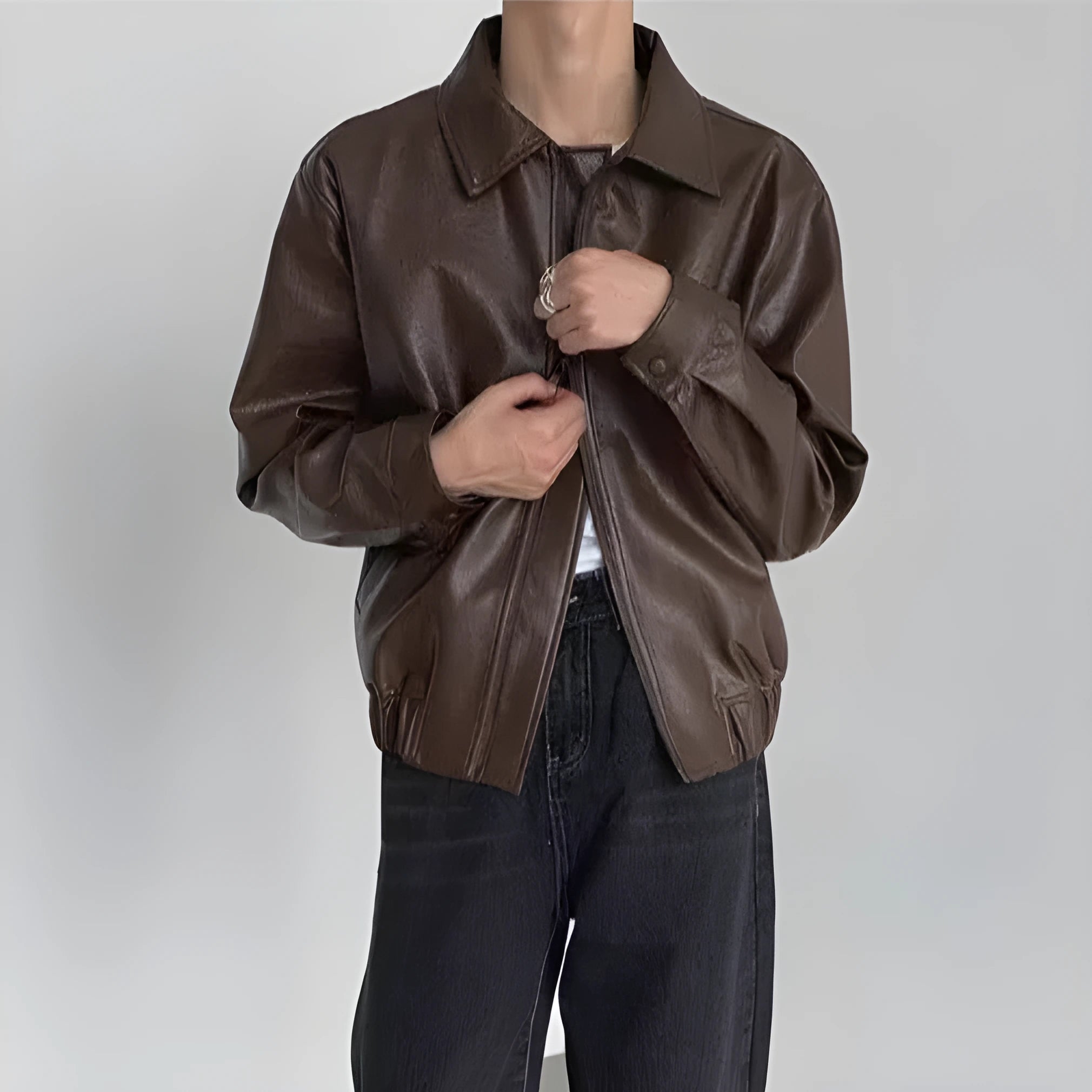 Korean-style brown PU leather jacket with straight hem, shown front view, available in sizes M to XXL