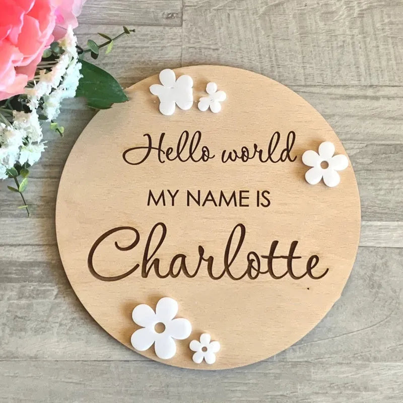 Square wooden baby name label showing birth details, 15cm on each side, in one of three style options.