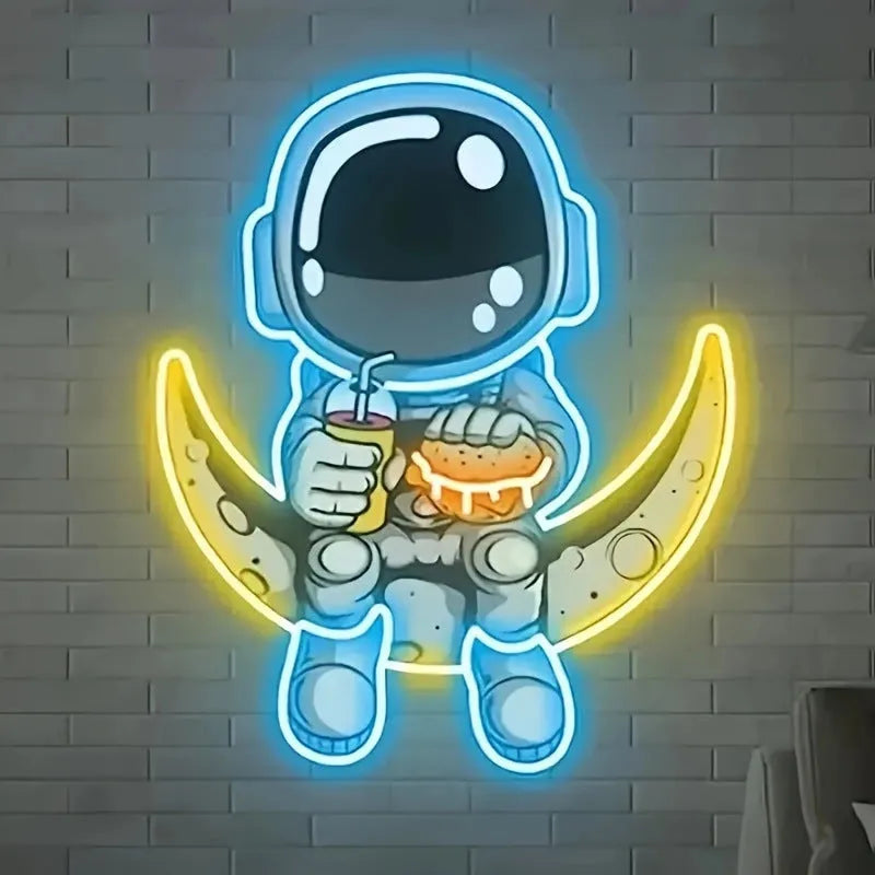 Wall mounted astronaut LED neon light with moon design and lemon yellow accents measuring 30x35cm